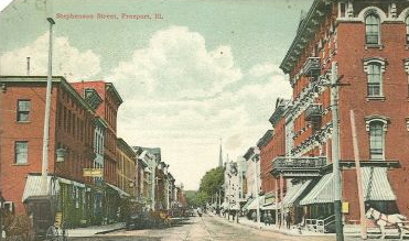 card postmarked in 1909 showing Stephenson Street and the Brewster Hotel