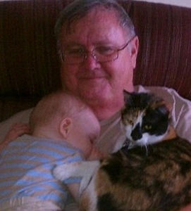 Pat Baker with grandchild and cat